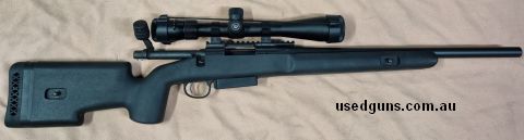 Remington 700 SPS Tactical in a Choate stock with a LaRue rail. Mag extender. KRG Bold handle. Includes a Vortex Viper 6.5-20x44 (and a scope sunshade that isn'