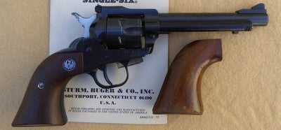 Ruger New Model Single Six .22LR revolver in good condition with a very good bore. Comes with spare timber grip and owner's manual. Additional images available 