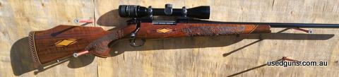 Weatherby Crown custom in .257 Weatherby Magnum. Gun is in Excellent condition, brand new and unfired. Comes with Original Weatherby 4 x 40 scope and factory cu
