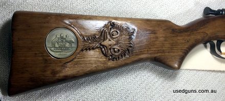 Joe Sharman hand carved original emu head with large gold inlayed Australian coat of arms coin. Highly sort after tribute to the Australian made rifle.