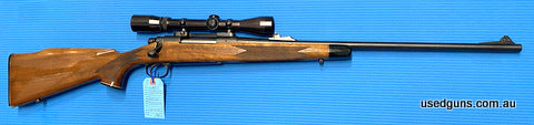 Very good condition 25-06 Remington 700. Mounted is a Burris 3-9X scope. Cycles well, woodwork in excellent condition and retains its gloss finish. Has express 