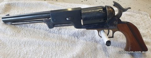 This huge black powder revolver is in very good overall condition. Blued barrel, breech, and backstrap, with engraved blued cylinder. Case hardened finish on fr