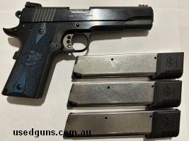 Colt 1911 Competition in excellent condition with three Wilson Combat 10 round magazines. Only fired 500 rounds.