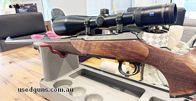 In great condition, beautiful timber stock. Comes with zeiss victory HT 3-12x56. Comes with open sights too.