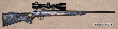 Solid package. Chinese copy of the Brno action. Flawless operation and accurate little 22. Fitted into a Boyd's thumbhole stock in blue/grey laminate. Fully fre