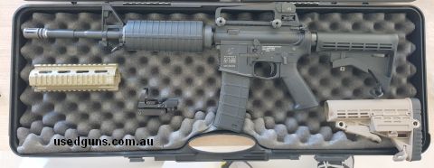 Top shelf replica M4, best on the market.  Full size, full weight, field strippable, working action, comes with desert tan foregrip, stock and dot sight, in pad