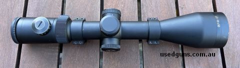 Great scope, illuminated reticle and everything works perfectly. Glass is excellent with no scratches, just has marks on the scope body from use. Comes with Leu