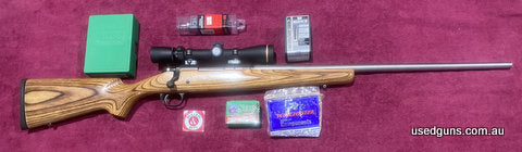 Excellent condition, nice package, 250 Savage bedded & floated In a Boyd‚Äö√Ñ√¥s laminated stock. New aftermarket stainless chambered barrel, Burris rings & bas