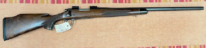 ¬†A good to very good Remington model 700B rifle in 22-250 Rem. It's in nice shape for it's age and is fitted with a heavy varmint barrel. Has rails fitted for 