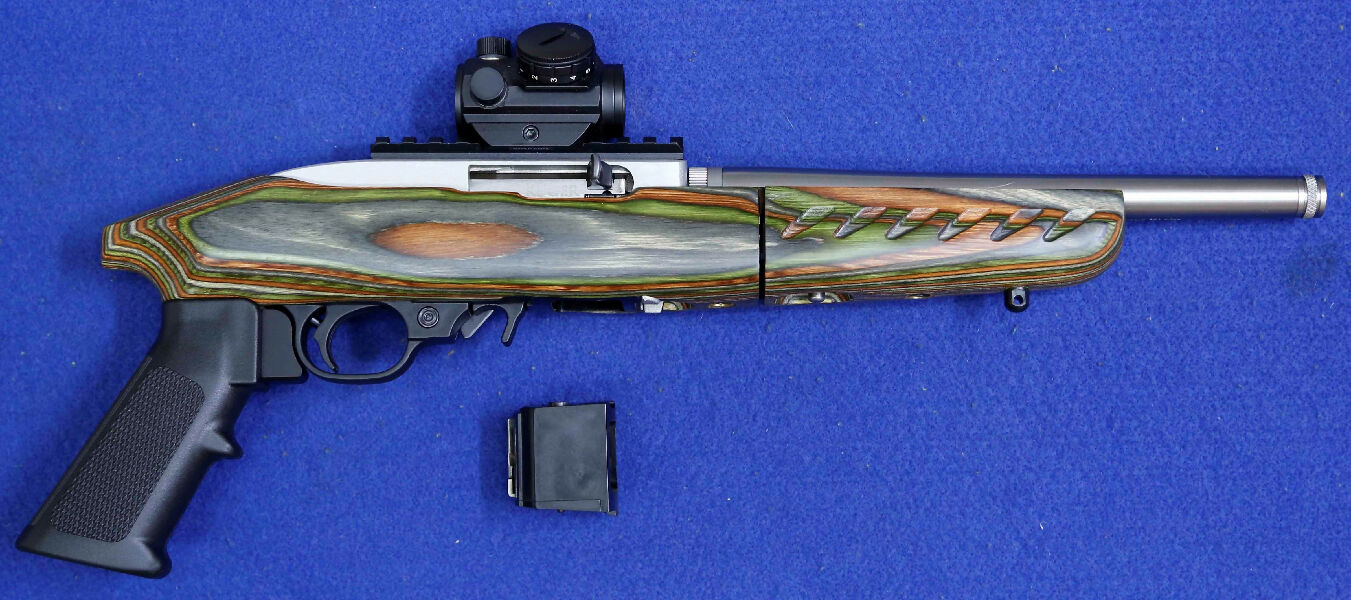 Ruger Charger, 2/10 shot rotary magazines , AK/Optics aim point, hard case.