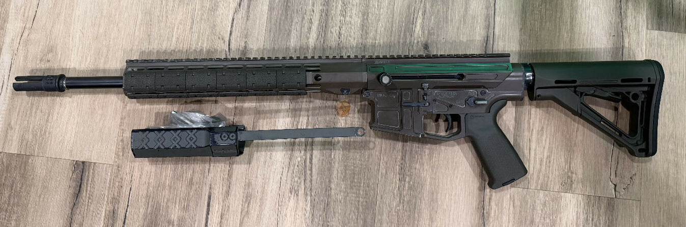 Oceania Precision SP15, great rifle extremely accurate, great condition, is Cerakote choc brown , Comes fitted with a surefire war comp, 10 round magazine inclu