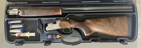Excellent condition, includes case, chokes, manuals. Beautiful wood. Very little use, I have just lost interest in the sport.