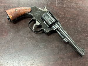 SMITH & WESSON
MILITARY & POLICE
38 S&W
6 SHOT
5" BARREL
GOOD PLUS BORE
MARKING UNITED STATES PROPERTY
ON TOP STRAP
FLAMING BOMB U.S. MILITARY MARKING
ON BOTTOM OF GRIP
W.B. INSPECTORS STAMP 
ON BOTTOM OF GRIP ALSO
ORIGINAL LANYARD RING
ORIGINAL TIMBER GRIPS
U.S. WWI & WWII MILITARY PI