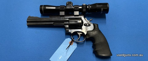Safari Firearms Handgun Sale! Very good nick Smith & Wesson 586 in 357 Mag. Sports a 6 inch barrel with a Tasco 1.25-4x scope mounted. Has rubberised grips inst
