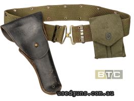 Original US Army issue Vietnam war period black holster for the M1911A1. 45 Pistol made by US Govt contractors "Bucheimer". Complete with original early issue U