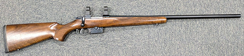 A CZ 527 in 223 Rem in very good condition. The rifle comes with CZ 1" rings that look to be high rings, set trigger, original box  and instruction manual.