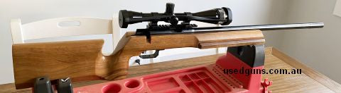 Very good condition, 1 owner, light use. Included is a fixed 36 Leupold scope, fine cross hairs in top condition, a hard cover, heavy duty case with wheels and 