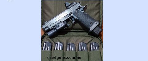 One of a kind. An STI Tactical 5.0 with custom single port chambered in 9mm. Has DVC grip and magwell, extended firing pin and custom slide milled with a Leupol