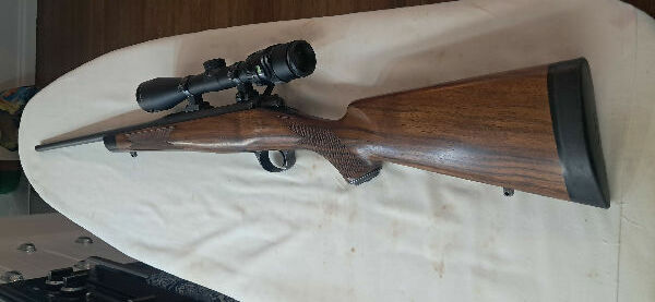 Beautiful kimber classic select grade, no longer sold and getting harder to come by, absolutely beautiful piece of high grade walnut. shoots very accurately wit