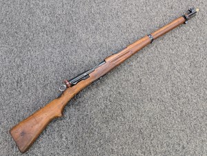 SWISS
SCHMIDT RUBIN
1911 CARBINE
7.5X55, 
6 SHOT
STRAIGHT PULL ACTION
MATCHING NUMBERS
SWISS MILITARY MARKINGS
MANUFACTURED 1929
ORIGINAL MUZZLE CAP
ORIGINAL SLING
#175241

EXC $890