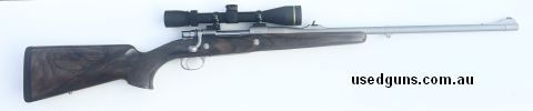 Custom FN98 in 7mm Rem Mag. Cerakoted stainless. Open sights fitted. Single stage trigger with safety. Hinged floor plate. Barrel band. Bedded and floated. Cros