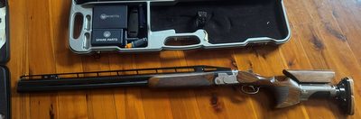 Gun is in Excellent condition. Comes with TSK RR adjustable stock with 2 coms, as well as original stock with 25 mm and 40 mm adjustable comb risers and origina