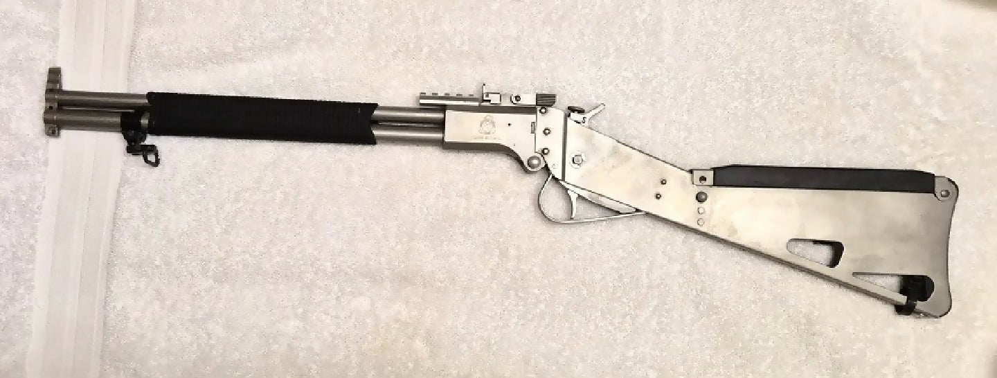 M6  Scout stainless steel  survival rifle in excellent condition, being fired just twice on the range. A major modification to the trigger was made by renowned 