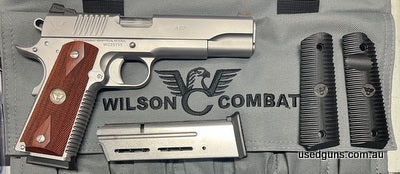 As new Wilson Combat 1911 ACP in 9mm. Has had Wilson Combat Coco Bolo grips added but also comes with the original black grips. Comes in Wilson Combat Soft case