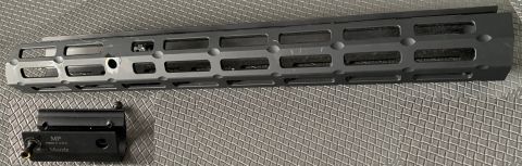 Midwest Industries M-Lok Tactical fore-end for Marlin 1894 or end cap attachment and Midwest Industries fore-end adaptor for barrel band models. Slight visual b