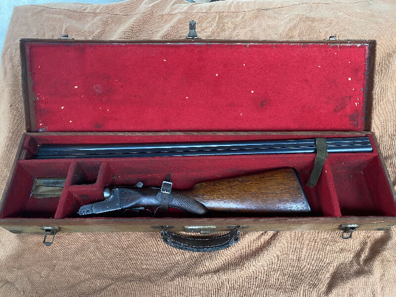 BSA side by side shotgun, cased.
