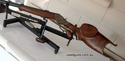 Pope style Stevens Schutzen rifle with palm rest color case hardened action and lever. No 4 oct /round barrel with scope. Blocks also tapped for tang sight its 
