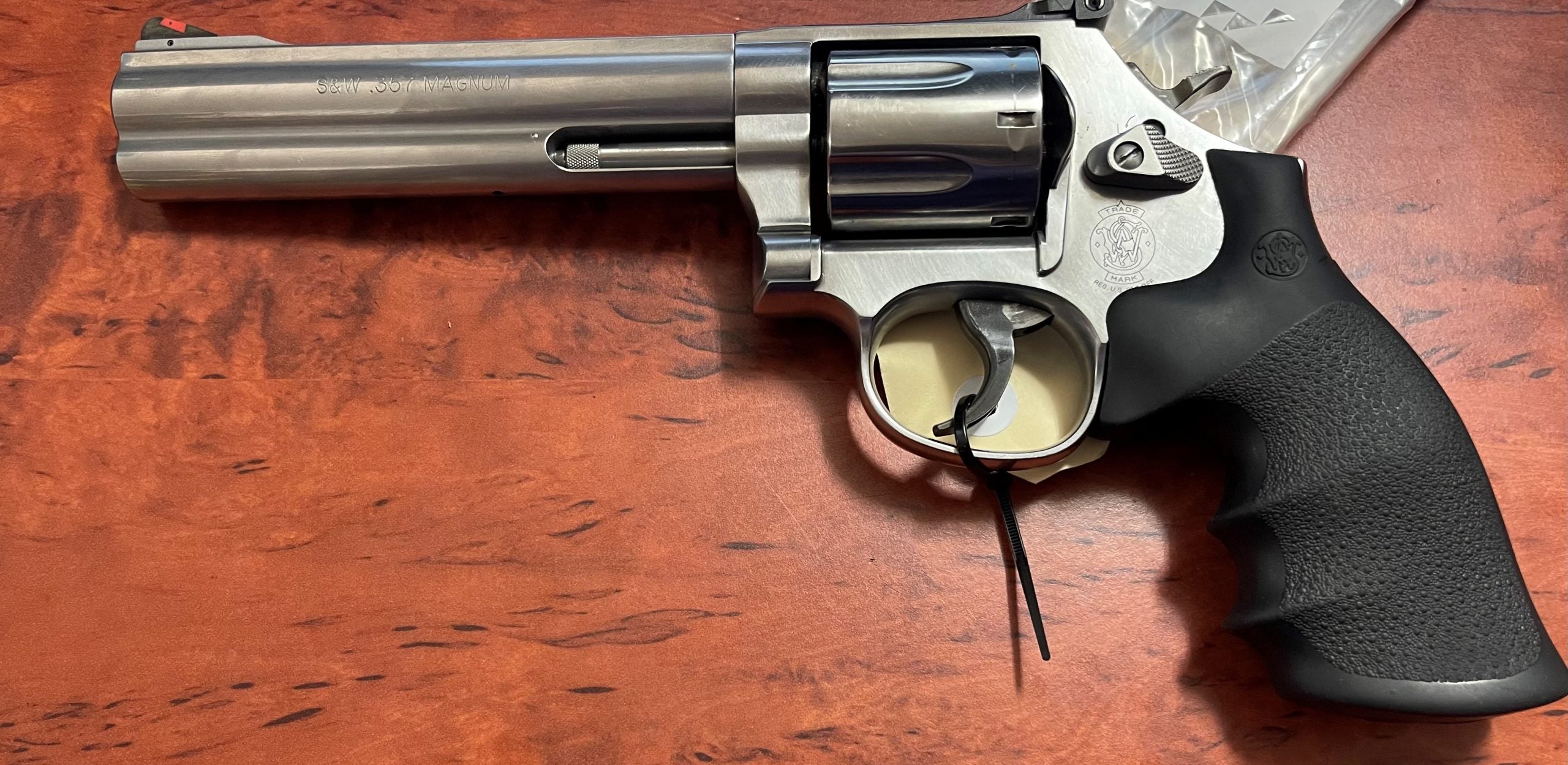 Used Smith and Wesson 686-6 Stainless steel revolver in 357 Magnum . Good condition. Adjustable rear sights, rubber grips, . Other springs for pistol supplied w