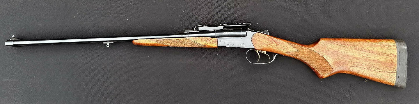 Baikal MP 221 side by side double rifle chambered in 30-06. Rifle comes with picatinny rail to suit scope / Red-dot sight but still has original open sights. gu