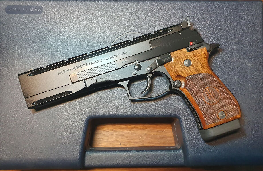 Beretta 87 Target Pistol execellent condition, very little use, aftermearket Beretta wooden grips (plus orginals), original Beretta case with accessories. Two m